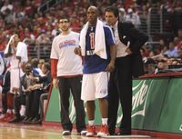 Chauncey Billups gets instructions from Vinny Del Negro.JPG