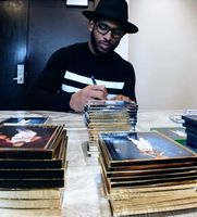 Chris Paul Autographing DVDs for Fans