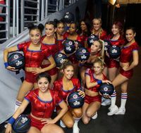 Clipper Spirit Girls in Various Hairdos Pose with Black Clippers Basketballs