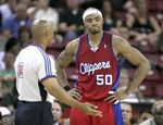 Corey Maggette listens to the referee's explanation.jpg
