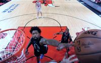 DeAndre Jordan Battles for a Rebound inside vs the Chicago Bulls