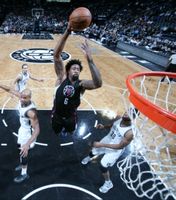 DeAndre Jordan in Black Clippers Jersey Flies in for a dunk in Brooklyn