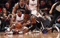 Eric Bledsoe battles Gerald Wallace for the loose ball in Brooklyn.JPG