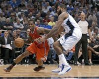 Eric Bledsoe drives baseline vs Kyle O'Quinn.JPG