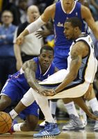 Eric Bledsoe pokes the ball away from Mike Conley.JPG