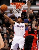 Eric Gordon goes for the reverse layup vs the Raptors.JPG