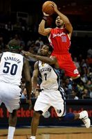Eric Gordon shoots on Tony Allen.JPG