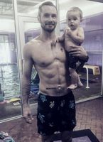 JJ Redick Shirtless with 6 pack abs holds his Baby Son Knox