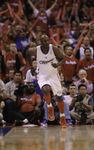 Lamar Odom runs back upcourt as the crowd cheers at Staples Center.JPG