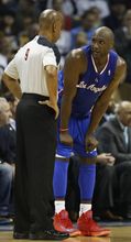 Lamar Odom talks to a referee.JPG