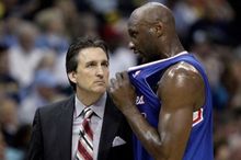 Lamar Odom talks with Vinny Del Negro during the playoffs.JPG