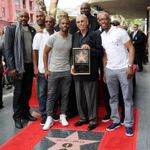 Ralph Lawler Getting His Hollywood Star of Fame Flanked by Chris Paul Sam Cassell Doc Rivers Corey Maggette Olden Polynice Lamond Murray and John Williams