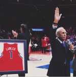 Ralph Lawler Thanks the Crowd during Ralph Lawler Day 2015 next to his Jersey
